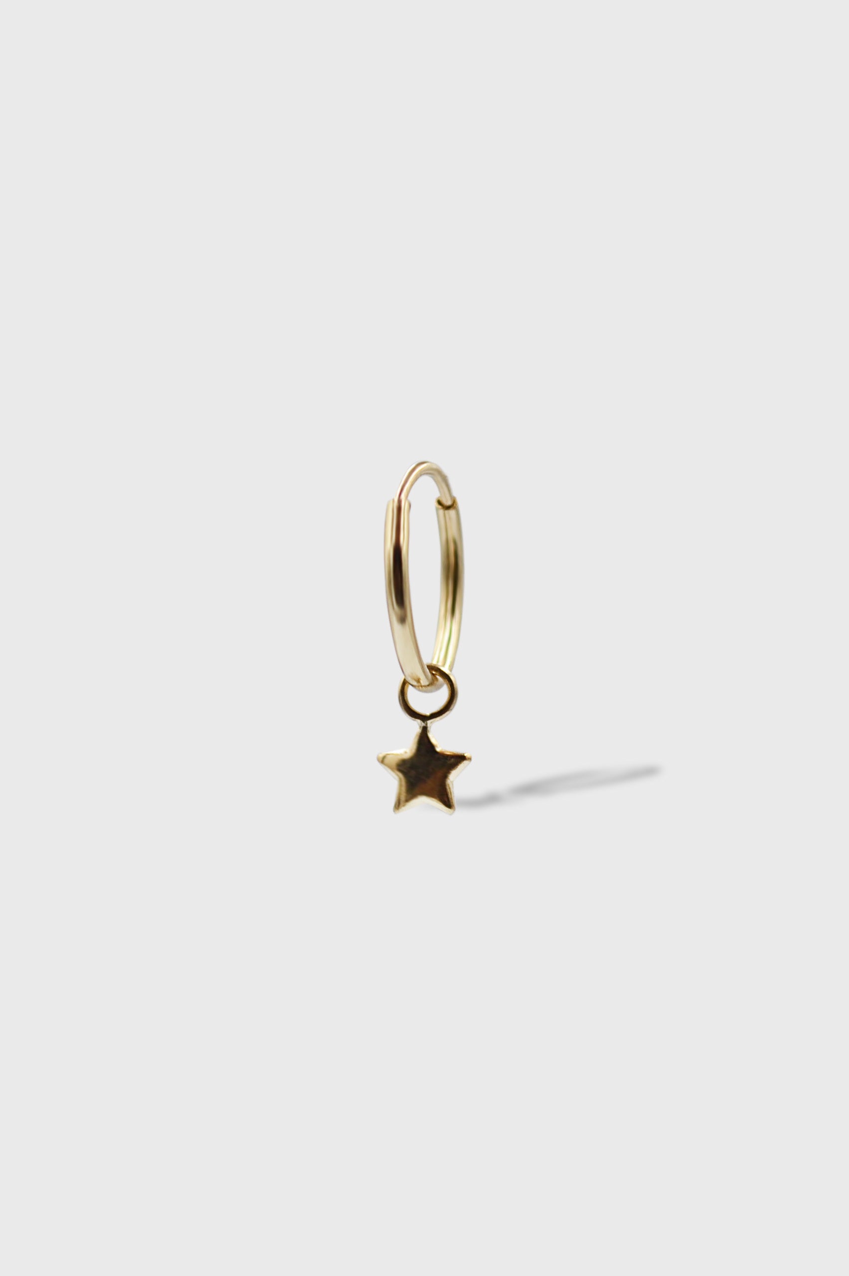ARRACADA CON DIJE DE ESTRELLA