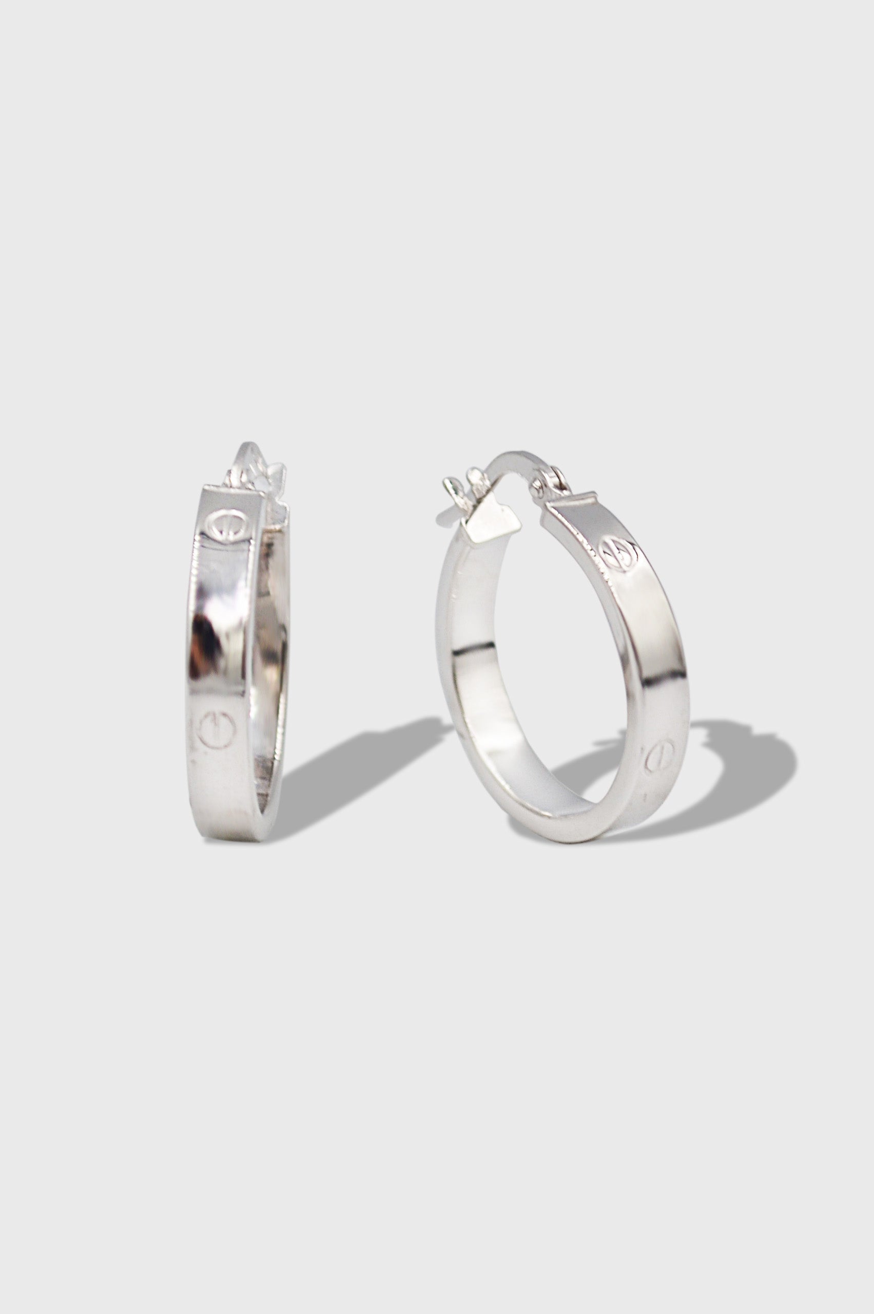 ARRACADAS TIPO CARTIER